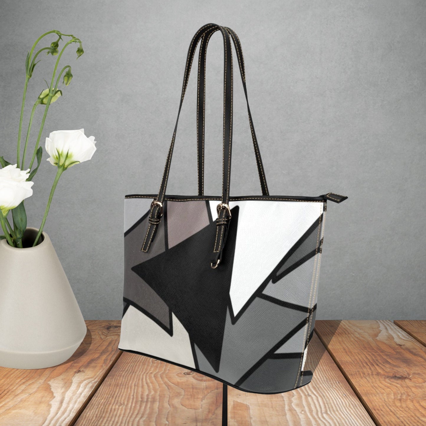 Triangle pattern faux leather tote bag for her with Shades of Gray, Black, and White on a stylish purse handbag with adjustable handles