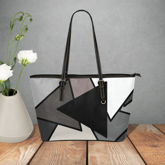 Triangle pattern faux leather tote bag for her with Shades of Gray, Black, and White on a stylish  purse handbag with adjustable handles